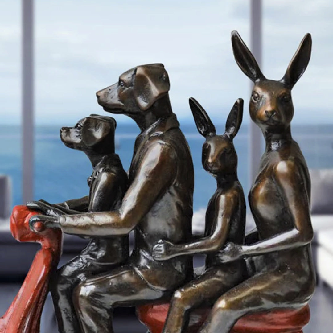 Gillie and Marc Sculpture ~ 'The Golden Family Vespa Riders' - Curate Art & Design in Daylesford, Gillie and Marc's premier gallery in Victoria, Australia.
