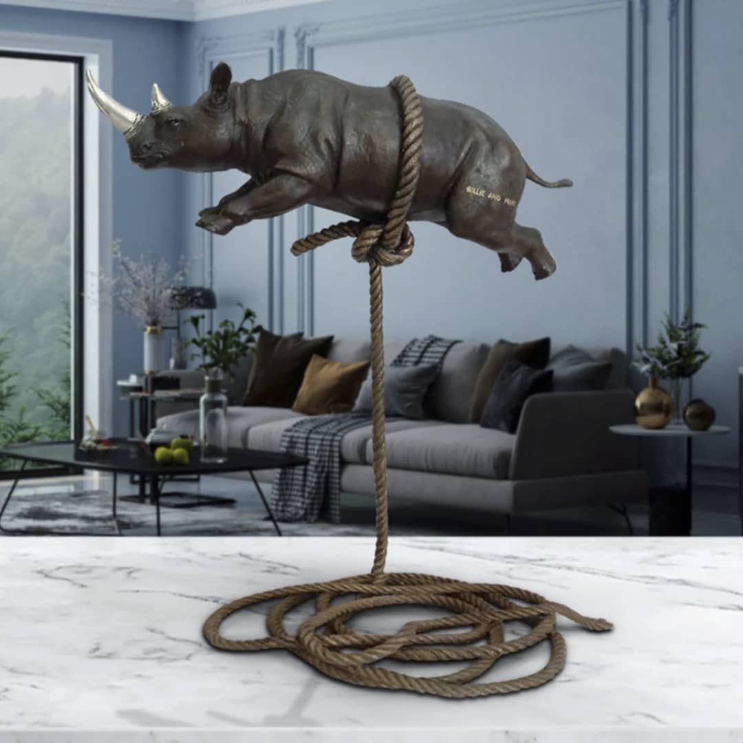 Gillie and Marc Sculpture ~ 'Flying Rhino on Short Rope with a Silver Horn'