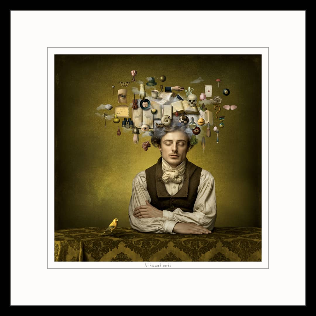 Maggie Taylor Art ~ 'A Thousand Words' 22" (Framed) - Available in Australia @ Curate Art & Design in Daylesford. Free delivery to Melbourne. 

A framed art print featuring a surrealist portrait of a man with a small yellow bird on his shoulder, set against a dark olive background with floating miscellaneous objects above his head. The print is presented with a white mat and a black frame.