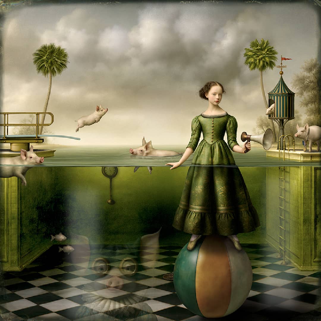Maggie Taylor Art ~ 'The Swimming Lesson' - Available in Australia exclusively @ Curate Art & Design in Daylesford. Free delivery Melbourne. 

A surreal fantasy artwork showing a young woman in a green dress standing on a striped ball in a checkered room, with pigs floating and swimming in a pool beneath the surface. Palm trees, a tower, and a cloudy sky fill the background.