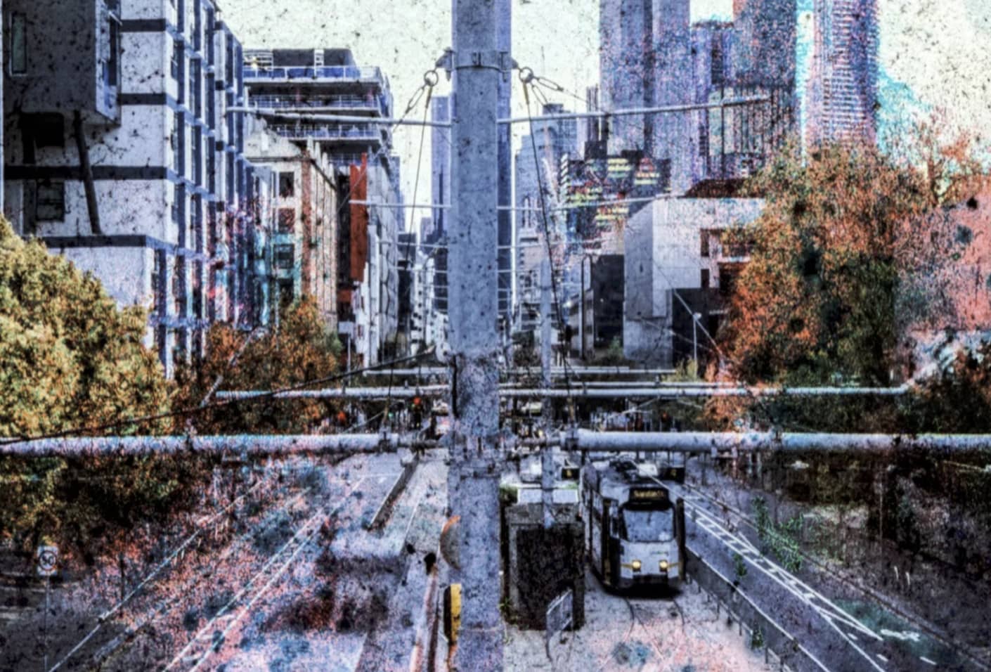 Matteo Volpi Photography Art ~ 'Swanston Bridge' - Available in Australia @ Curate Art & Design, a must-visit art gallery in Daylesford, Victoria.
Cityscape with modern buildings and a tram on tracks