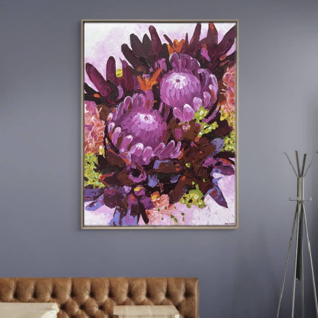 Nancy Cover original painting ~ 'Kings and Queens' @ Curate Art & Design, must-visit art gallery in Daylesford, Victoria.
Colorful floral arrangement with a focus on purple flowers against a light purple background