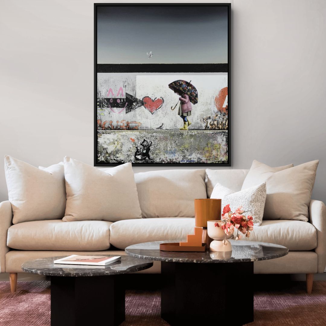 UK artist Steve Johnston painting ~ 'Hi Bird' @ Curate Art & Design (Daylesford, Melbourne) - Steve Johnston's exclusive representatives in Australia.

A artwork depicting a child in a pink coat and yellow rain boots walking under a floral umbrella on a graffiti-covered wall, with a seagull in the sky above.