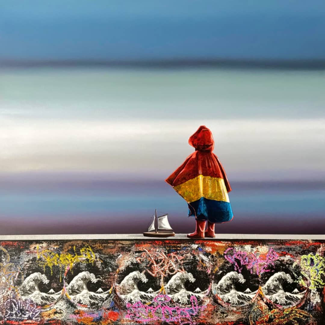 UK artist Steve Johnston painting ~ 'The Beginning of a Great Adventure' - exclusively in Australia at Curate Art & Design in Daylesford, Melbourne, Australia.

A stylised artwork showing a small figure wrapped in a red, yellow, and blue striped cloth standing on a ledge beside a tiny sailboat, with a multicolored wave-patterned foreground and a soft blue gradient sky behind.