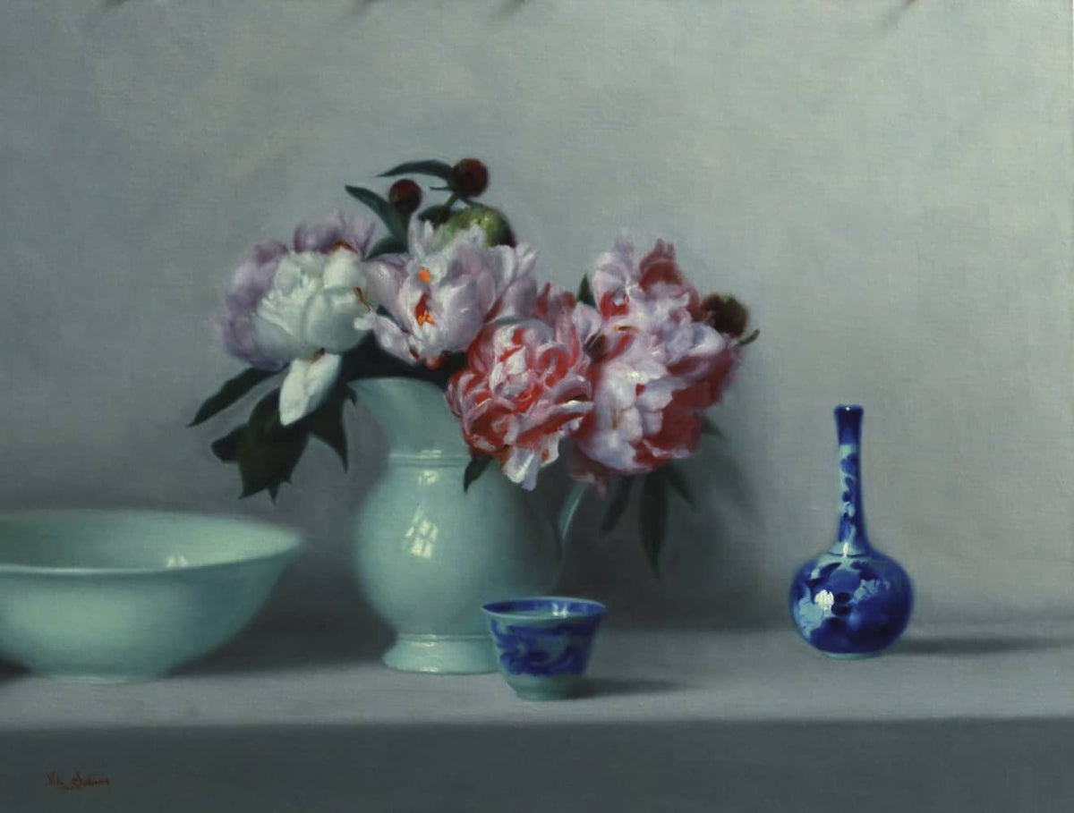 Vicki Sullivan (Archibald Prize Finalist 2026) painting ~ 'Peonies in French Jug' @ Curate Art & Design in Daylesford, Victoria (formerly Sorrento).

A still life painting featuring a bouquet of pink, red, and white peonies in a pale green vase, alongside a light green bowl, a small blue-and-white cup, and a blue decorative bottle against a muted gray background.